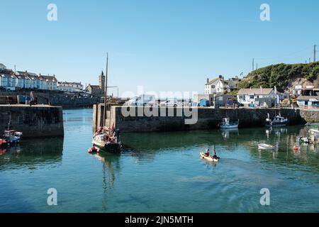 A beautiful ketch leaves Porthleven harbour Stock Photo