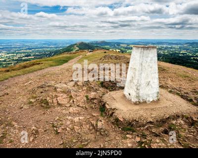 Trig point at the summit of Worcestershire Beacon in the Malvern Hills AONB England Stock Photo