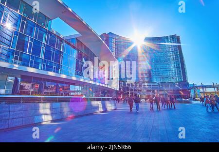 MILAN, ITALY - APRIL 9, 2022: Piazza Gae Aulenti square with modern office buildings, on April 9 in Milan, Italy Stock Photo