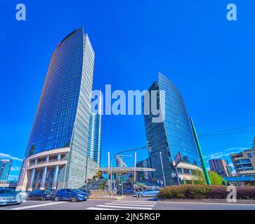 MILAN, ITALY - APRIL 9, 2022: Piazza Gae Aulenti with its glass skyscrapers is the symbol of modern Milan, on April 9 in Milan, Italy Stock Photo