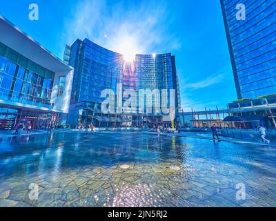 MILAN, ITALY - APRIL 9, 2022: The modern mountains of glass and concrete, Piazza Gae Aulenti, on April 9 in Milan, Italy Stock Photo