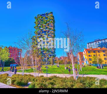 MILAN, ITALY - APRIL 9, 2022: Biblioteca degli Alberi Park is one of the largest in the city and boasts great views on Vertical Forest buildings, on A Stock Photo