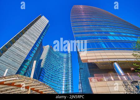 MILAN, ITALY - APRIL 9, 2022: Piazza Gae Aulenti is a heart of modern district, on April 9 in Milan, Italy Stock Photo