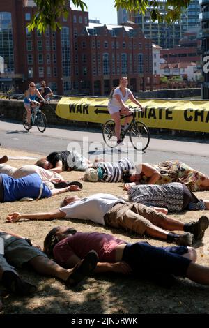 Bristol, UK. 9th Aug, 2022. Peace groups are remembering the lives of those killed when the A-Bomb was dropped on Nagasaki in World War Two. A Die-in was carried out at 11.02am, the same time that Nagasaki was bombed on 9th Aug 1945. Credit: JMF News/Alamy Live News Stock Photo