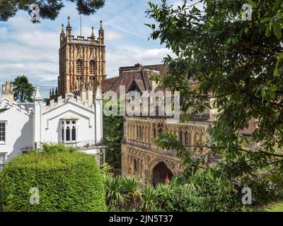 Tower of Great Malvern Priory and the Abbey Gateway in Great Malvern Worcestershire England Stock Photo