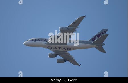 Qatar Airbus A380 A7-APF leaving London Heathrow en route to Doha on 9 August 2022 during a London heatwave. Stock Photo