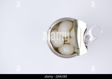 longans fruits in a tin container on white background  Stock Photo