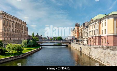 Norrstrom River, with Utrikesdepartementet, or Ministry for Foreign Affairs on the right, and Riksdagshuset, the Swedish Parliament House on the left, Gamla Stan, or Old town, Stockholm, Sweden Stock Photo