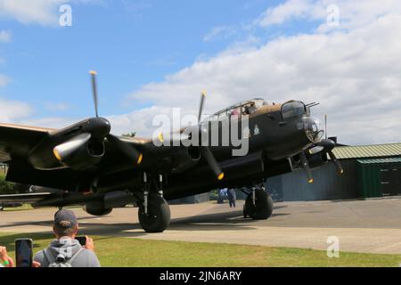 Avro Lancaster NX611 'Just Jane' at the Lincolnshire Aviation Heritage Centre Stock Photo