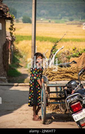 Unidentified children come back home after work job. Stock Photo