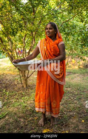 Beautiful Bengali, Indian woman smiling at the camera. Stock Photo