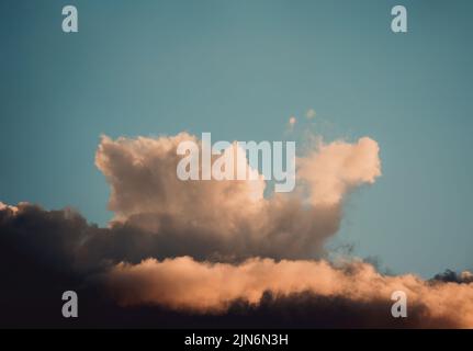 Cloud in a form of snail or dragon Stock Photo