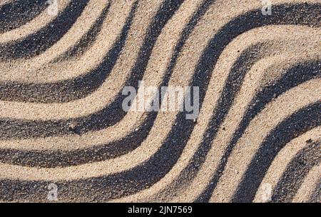 Wavy pattern of natural beach sand background for summer designs Stock Photo