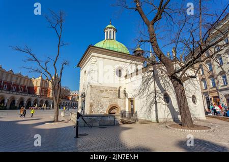 Krakow, Poland - 14 March, 2022: Church of St. Wojciech, 11th-century Roman Catholic church on Main Market Square in Old Town Stock Photo