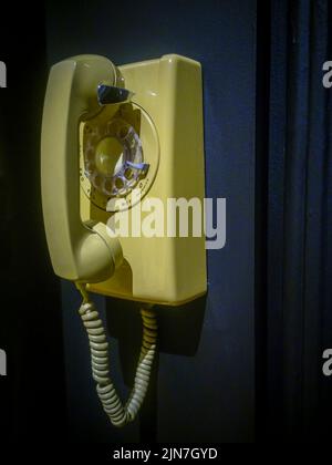 A vintage dial wall-mounted landline telephone is seen in New York on Saturday, July 23, 2022. (© Richard B. Levine) Stock Photo