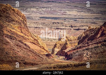 US 50 - a transcontinental highway in the USA winding through the dramatic San Rafel Canyon of Utah with canyonlands stretching as far as the eye can Stock Photo