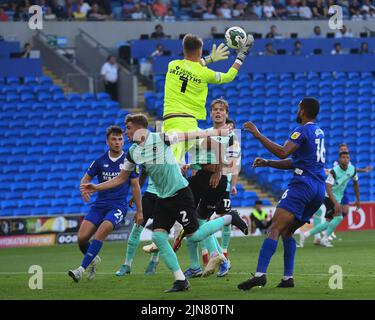 Cardiff, UK. 09th Aug, 2022. Josh Griffiths #1 of Portsmouth, claims the ball in Cardiff, United Kingdom on 8/9/2022. (Photo by Mike Jones/News Images/Sipa USA) Credit: Sipa USA/Alamy Live News Stock Photo