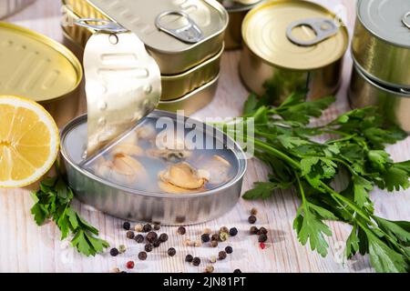 Canned seafood, whole shelled clams Stock Photo