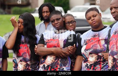 Ferguson, United States. 09th Aug, 2022. Family members wipe away tears as they celebrate the life of Michael Brown Jr. at the spot where he was shot dead eight years ago, in Ferguson, Missouri on Tuesday August 9, 2022. On August 9, 2014, Michael Brown Jr. was fatally shot by Ferguson Police Officer Darren Wilson after a altercation ensued. Johnson was with Brown at the time of the shooting.This event ignited unrest in Ferguson. Photo by Bill Greenblatt/UPI Credit: UPI/Alamy Live News Stock Photo