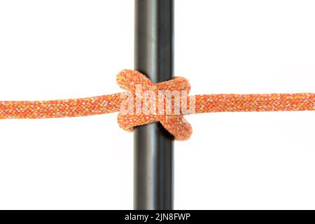 The clove hitch is a type of knot. Along with the bowline and the sheet bend, it is often considered one of the most important knots Stock Photo
