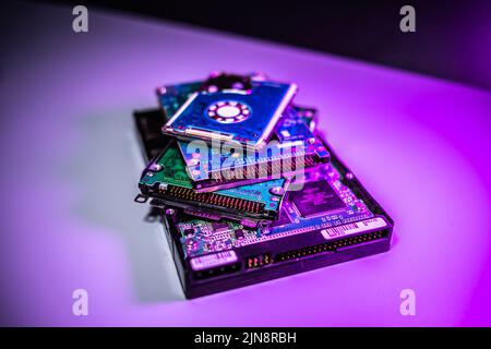 Range of hard drives isolated on purple background Stock Photo