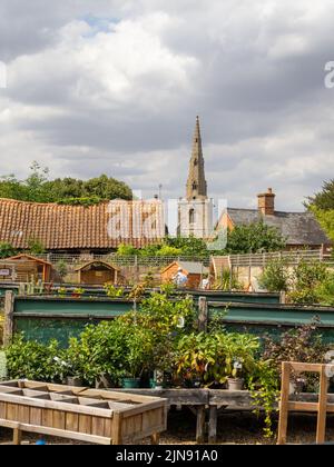 Cherry Lodge garden centre in the village of Podington, Bedfordshire, UK; with the church spire visible in the background. Stock Photo