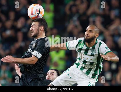 BUDAPEST, HUNGARY - AUGUST 9: Gara Garayev of Qarabag FK fouls Aissa  Laidouni of Ferencvarosi TC during the UEFA Champions League Qualifying  Round match between Ferencvarosi TC and Qarabag FK at Ferencvaros