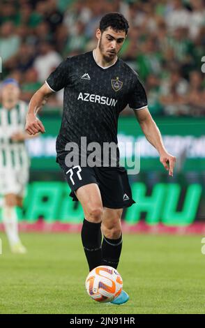 BUDAPEST, HUNGARY - AUGUST 9: Gara Garayev of Qarabag FK fouls Aissa  Laidouni of Ferencvarosi TC during the UEFA Champions League Qualifying  Round match between Ferencvarosi TC and Qarabag FK at Ferencvaros