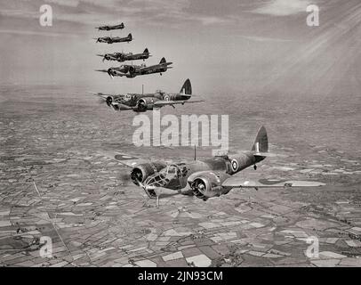 Blenheim Mark IVFs of No. 254 Squadron RAF, flying in formation over Northern Ireland shortly after the units arrival at Aldergrove, County Antrim. The Bristol Blenheim was a British light bomber aircraft used extensively in the first two years of the Second World War. In addition to operating as medium bombers, some were converted into heavy fighters by the addition of four Browning .303 machine guns mounted under the fuselage. Stock Photo