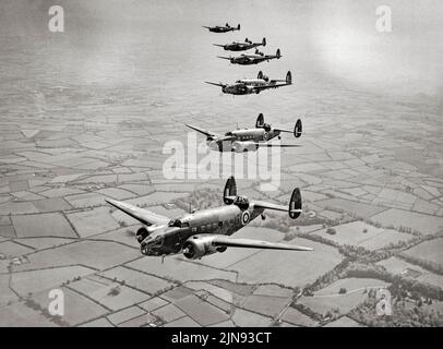 Lockheed Hudson Mark IIs and IIIs of No. 233 Squadron RAF based at Aldergrove, County Antrim, flying over Northern Ireland. The Hudson served throughout the war, mainly with Coastal Command but also in transport and training roles, as well as delivering agents into occupied France. Stock Photo