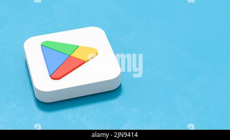 Google Play Store App 2022 Icon on Blue with Copy Space Stock Photo