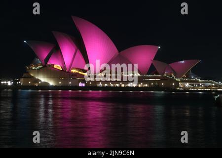 Sydney, Australia. 10th Aug, 2022. Sydney Opera House lights up pink in memory of Olivia Newton-John, the singer and Grease actress who passed away on Monday in California, USA. Credit: Richard Milnes/Alamy Live News Stock Photo