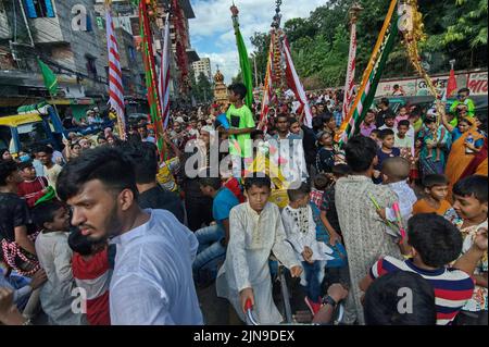 Dhaka, Bangladesh. 09th Aug, 2022. People participate in Ashura traditions in the Bihari Camp in Dhaka, Bangladesh on Aug. 9, 2022. In the capital Dhaka today, Shia community and Sunnis from Bihari camp observed Ashura with solemn fanfare, which was limited in last 2 years due to lock-down. (Photo by Md Saiful Amin/Pacific Press/Sipa USA) Credit: Sipa USA/Alamy Live News Stock Photo