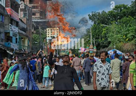 Dhaka, Bangladesh. 09th Aug, 2022. People participate in Ashura traditions in the Bihari Camp in Dhaka, Bangladesh on Aug. 9, 2022. In the capital Dhaka today, Shia community and Sunnis from Bihari camp observed Ashura with solemn fanfare, which was limited in last 2 years due to lock-down. (Photo by Md Saiful Amin/Pacific Press/Sipa USA) Credit: Sipa USA/Alamy Live News Stock Photo