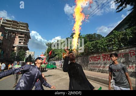 Dhaka, Bangladesh. 09th Aug, 2022. People participate in Ashura traditions in the Bihari Camp in Dhaka, Bangladesh on Aug. 9, 2022. In the capital Dhaka today, Shia community and Sunnis from Bihari camp observed Ashura with solemn fanfare, which was limited in last 2 years due to lock-down. (Photo by Md Saiful Amin/Pacific Press/Sipa USA) Credit: Sipa USA/Alamy Live News Stock Photo