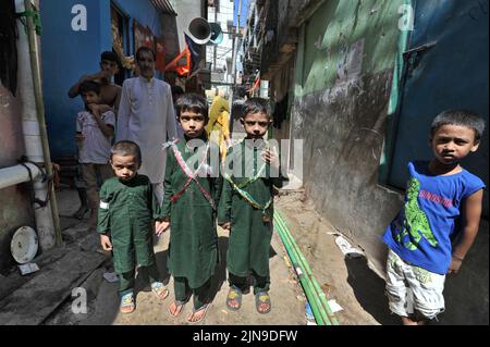 Dhaka, Bangladesh. 09th Aug, 2022. People participate in Ashura traditions in the Bihari Camp in Dhaka, Bangladesh on Aug. 9, 2022. In the capital Dhaka today, Shia community and Sunnis from Bihari camp observed Ashura with solemn fanfare, which was limited in last 2 years due to lock-down. (Photo by Md Saiful Amin/Pacific Press/Sipa USA) Credit: Sipa USA/Alamy Live News Stock Photo