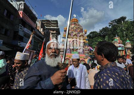 People participate in Ashura traditions in the Bihari Camp in Dhaka, Bangladesh on Aug. 9, 2022.  In the capital Dhaka today, Shia community and Sunnis from Bihari camp observed Ashura with solemn fanfare, which was limited in last 2 years due to lock-down. (Photo by Md Saiful Amin/Pacific Press/Sipa USA) Stock Photo