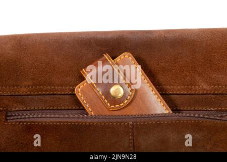 Luxury craft business card holder case made of leather. Brown Leather box for cards in a pocket of bag Stock Photo