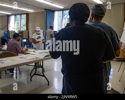 Milwaukee, Wisconsin, USA. 9th Aug, 2022. Voters wait to sign in and receive their ballots. (Credit Image: © Sue Dorfman/ZUMA Press Wire) Stock Photo