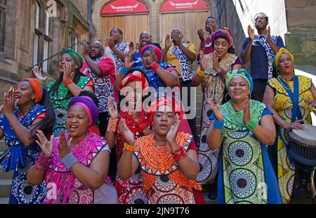EdFringe: Assembly Hall, The Mound, Edinburgh, Scotland. Wednesday 10 August.16 members of the Soweto Gospel Choir sing in honour of the father of their rainbow nation, Nelson Mandela, and to celebrate and commemorate South Africa’s democratic movement’s struggle for freedom. Credit Arch White.alamy live news. Stock Photo