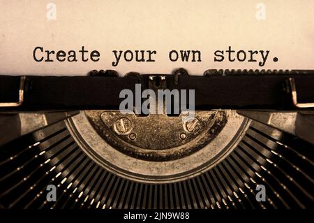 Create your own story words typed on an old vintage typewriter in black and white. Stock Photo