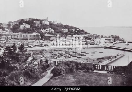 Torquay, Devon, England.  A general view from Waldron Hill in the 19th century.  From Around The Coast,  An Album of Pictures from Photographs of the Chief Seaside Places of Interest in Great Britain and Ireland published London, 1895, by George Newnes Limited. Stock Photo