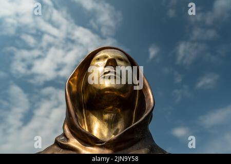 Budapest, Hungary -August 7, .2022:  Portrait of the statue of Satoshi Nakamoto mysterious founder of Bitcoin and Blockchain technology in; created by Stock Photo