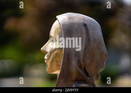 Budapest, Hungary -August 7, .2022:  Portrait of the statue of Satoshi Nakamoto mysterious founder of Bitcoin and Blockchain technology in; created by Stock Photo