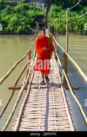 Footbridge across Nam Khan river, Luang Prabang, Laos Stock Photo