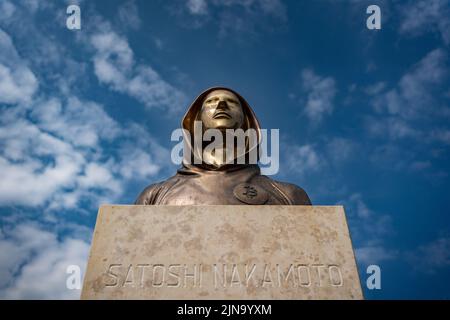 Budapest, Hungary -August 7, .2022:  Portrait of the statue of Satoshi Nakamoto mysterious founder of Bitcoin and Blockchain technology in; created by Stock Photo