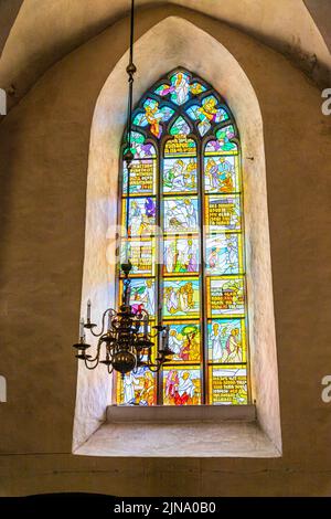 Modern stained glass in the Church of the Holy Ghost or Church of the Holy Spirit (Püha Vaimu kirik) in the old town of Tallinn the capital city of Es Stock Photo