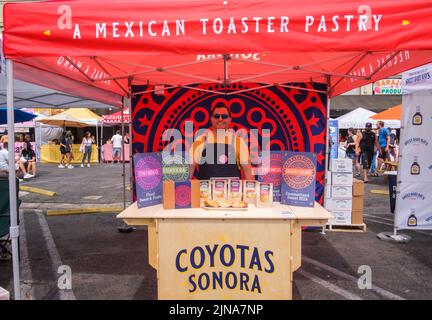 Food vendors at Smorgusburg LA, food carts, food trucks, vendor booths. Downtown Los Angeles, California, USA Stock Photo