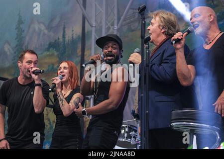 Howard Carpendale, popular singer, performs on stage at Cranger Kirmes with band, Germany Stock Photo