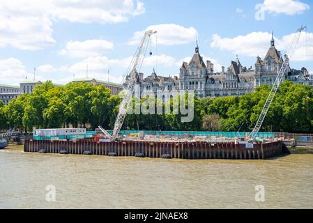 Construction work in progress by Victoria Embankment, London for the Thames Tideway Tunnel super sewer project under construction under the Thames Stock Photo